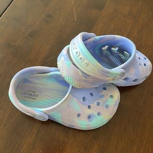 Girls toddler size 8 crocs. Used but good condition purple/blue swirl